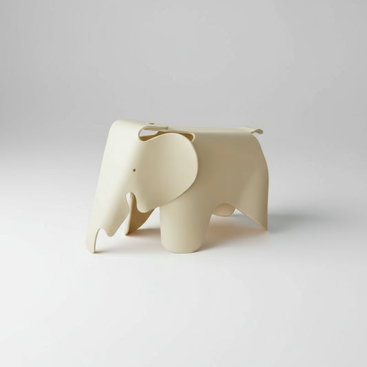 Beige elephant-shaped decor item on a white background