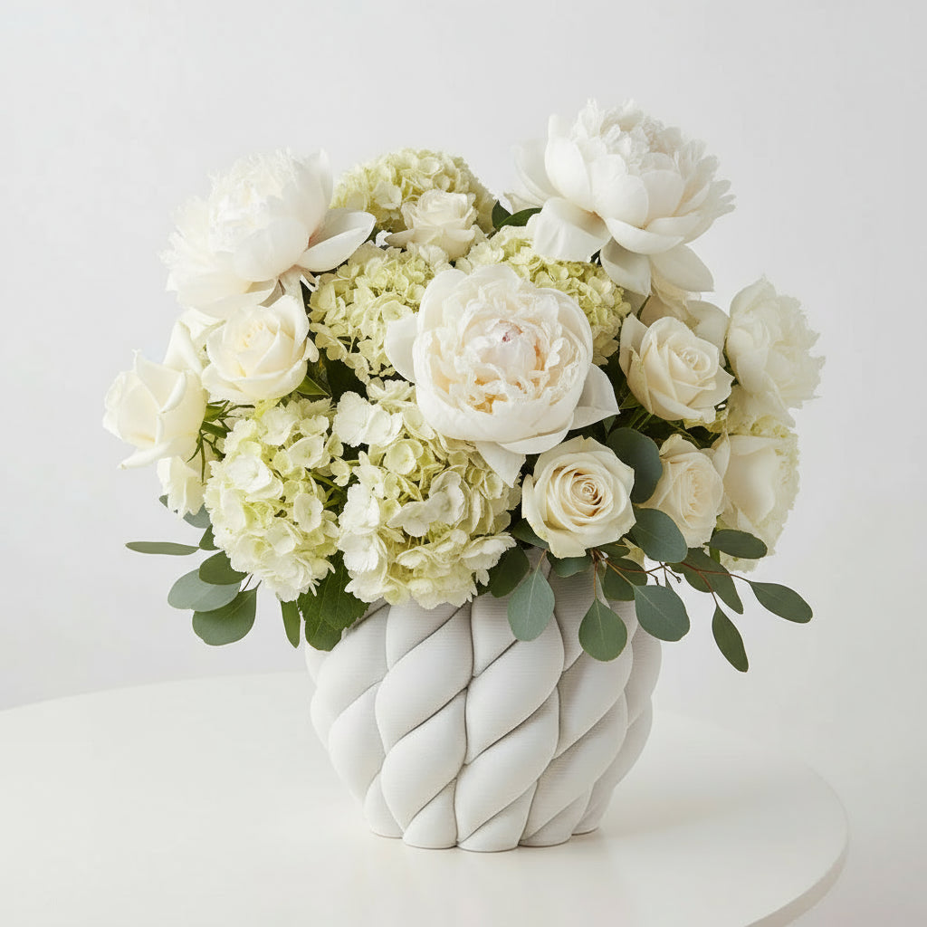 White woven vase on a light gray background