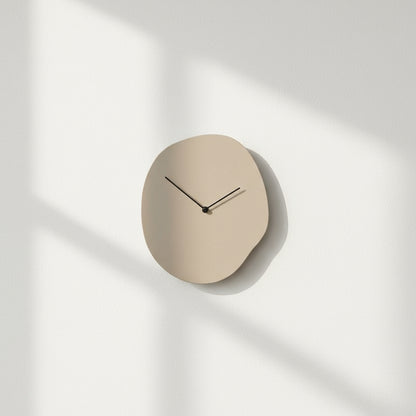 Beige wall clock with dimensions indicated on a white background