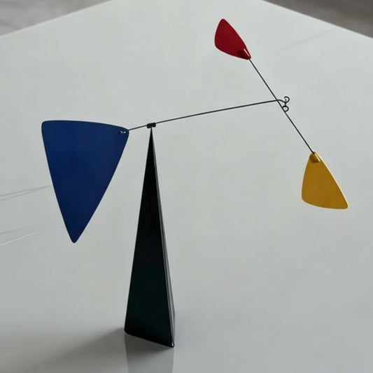 Abstract sculpture with geometric shapes on a white background