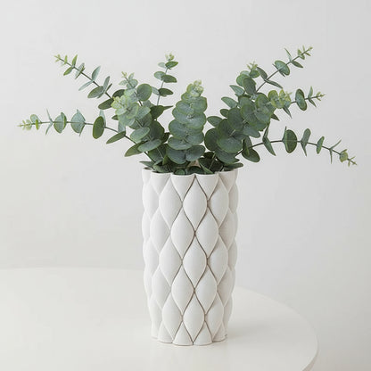 White textured vase with dimensions on a light gray background