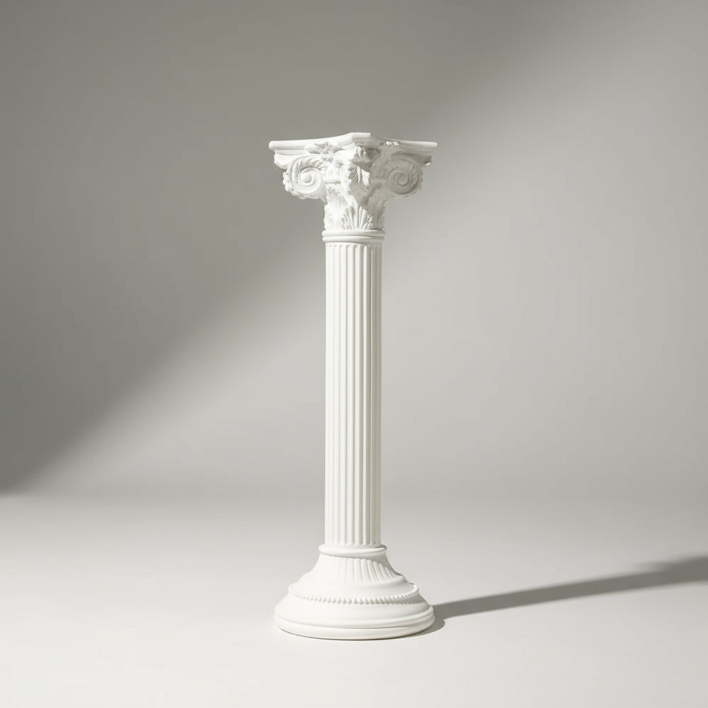 Decorative white column on a neutral background