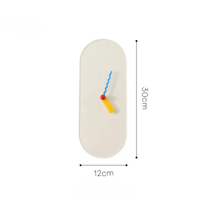  white oval clock with colorful sticks on a white background