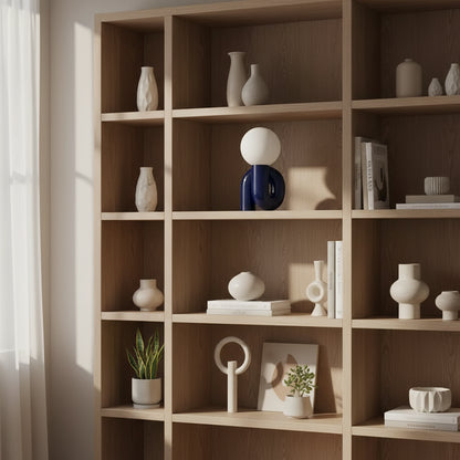decorative lamps with spherical tops and curved bases on a modern book shelf