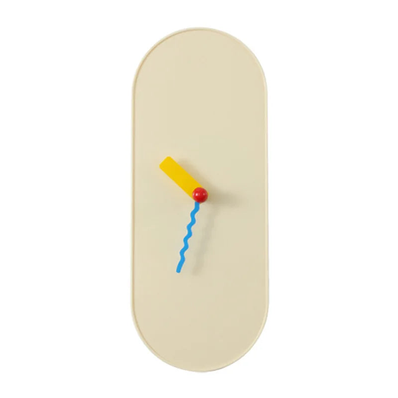 Beige oval clock with a yellow and red ball and blue string on a white background