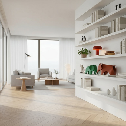 Two elephant-shaped bookends, one green and one brown, on a shelf