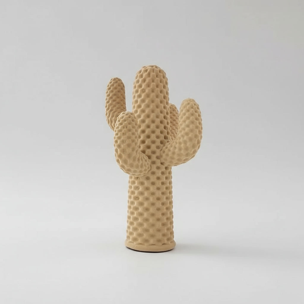 Textured cactus-shaped object  on a white background