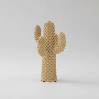 Textured cactus-shaped object  on a white background